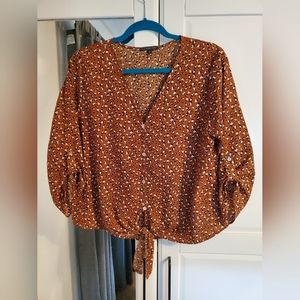 Tie front animal print blouse